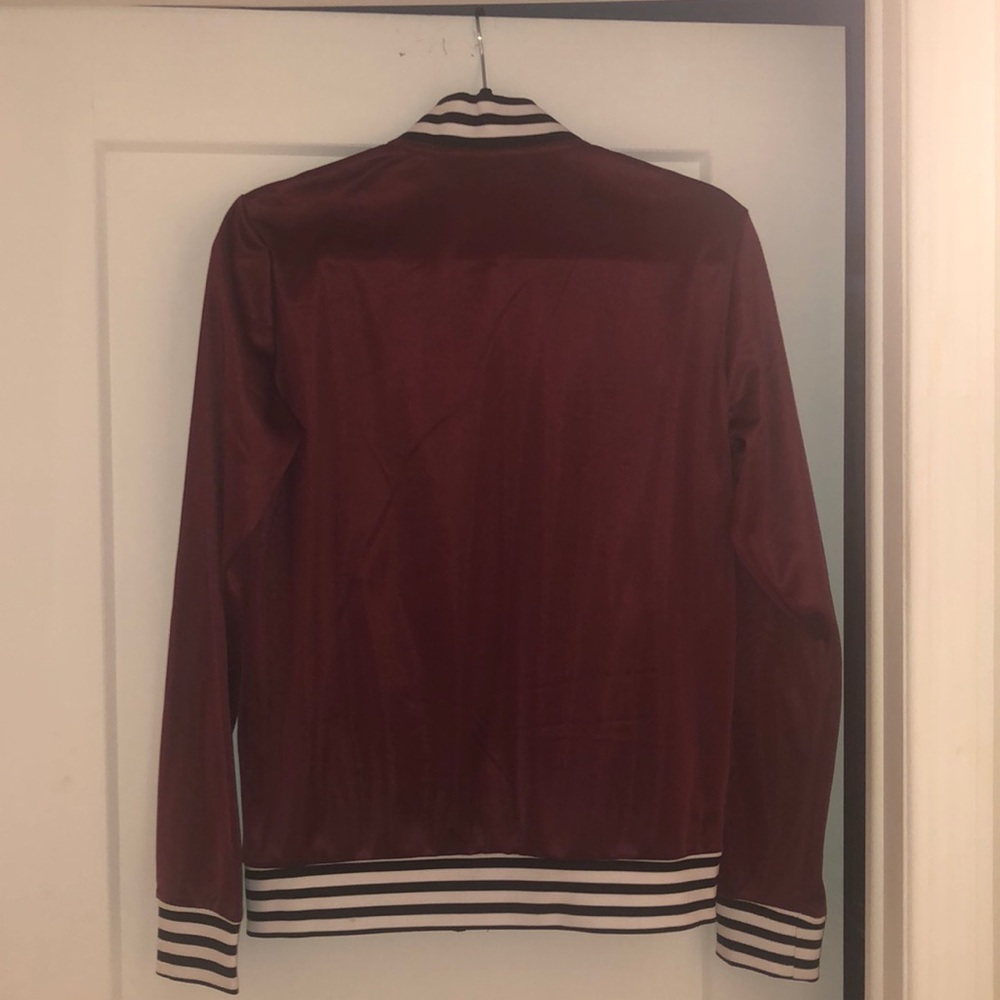 A red jacket - Picture 2 of 2